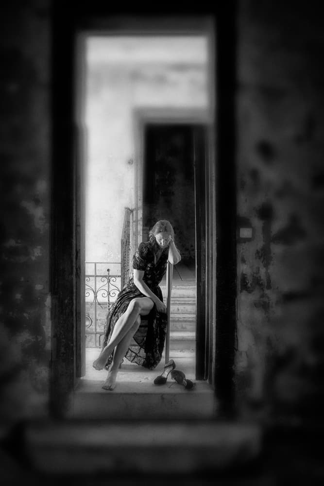 Pensive Woman in Doorway by Enrico Facchetti — canvas wall art