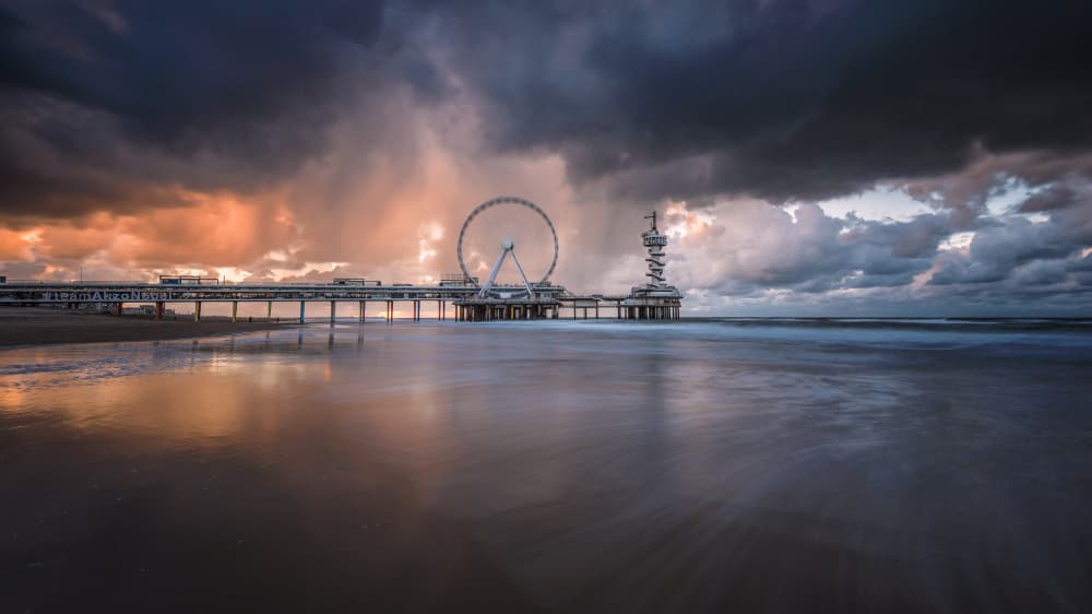 Stormy Pier Sunset by Jean Vandijck — canvas wall art