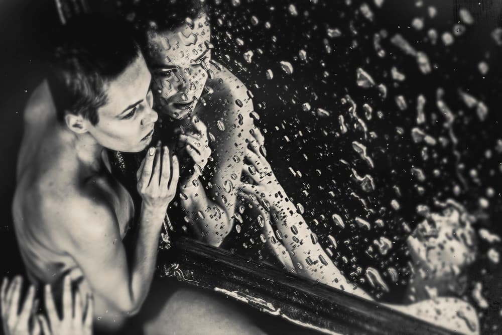 Woman In Wet Reflection by Bogdan Bouşcă — canvas wall art