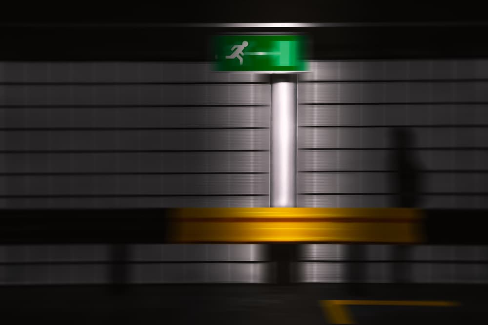 Blurred Exit Sign by Marc Huybrighs — canvas wall art