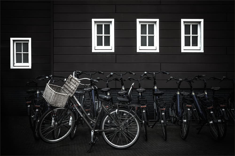 Bikes Against Dark Wall by Gilbert Claes — canvas wall art