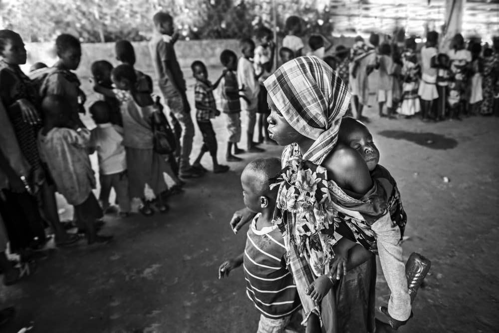 African Mother and Children by Foad Mirzaie — canvas wall art