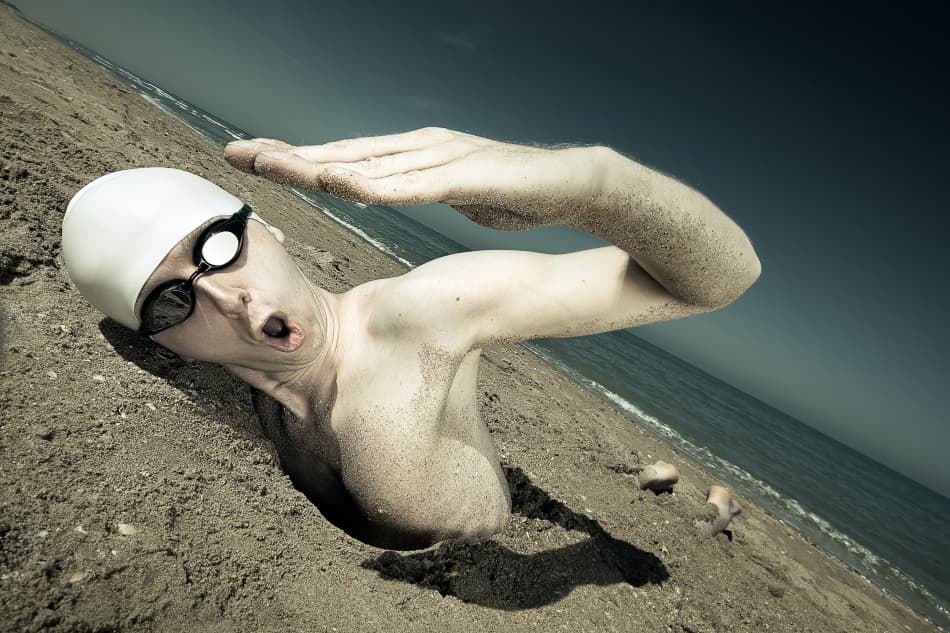 Buried Beach Swimmer by Christophe Kiciak — canvas wall art