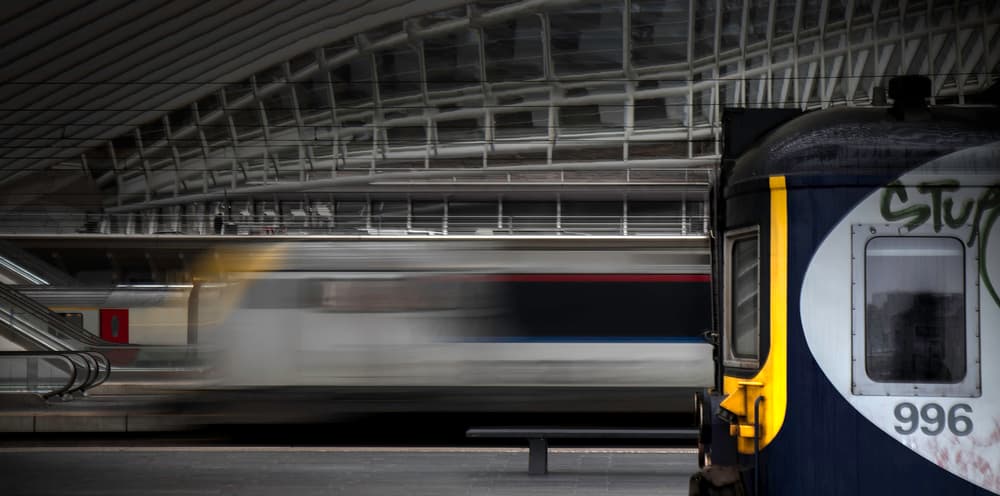 Fast Train Through Station by Gilbert Claes — canvas wall art