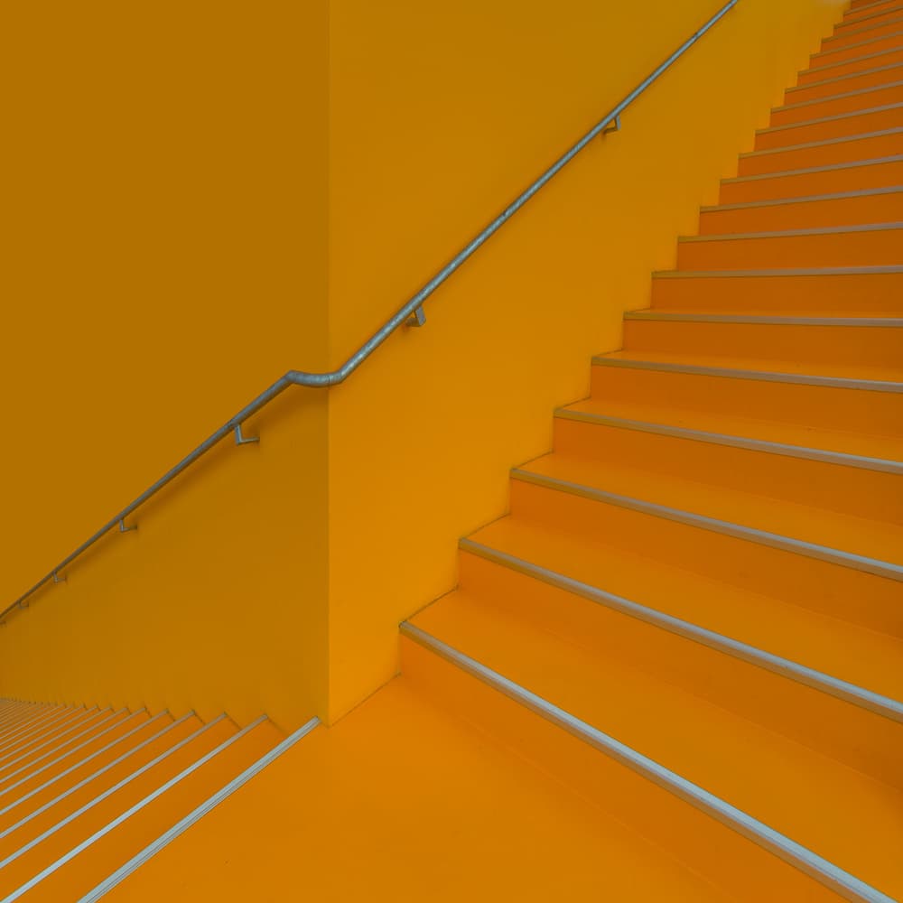Vibrant Orange Staircase by Rolf Endermann — canvas wall art