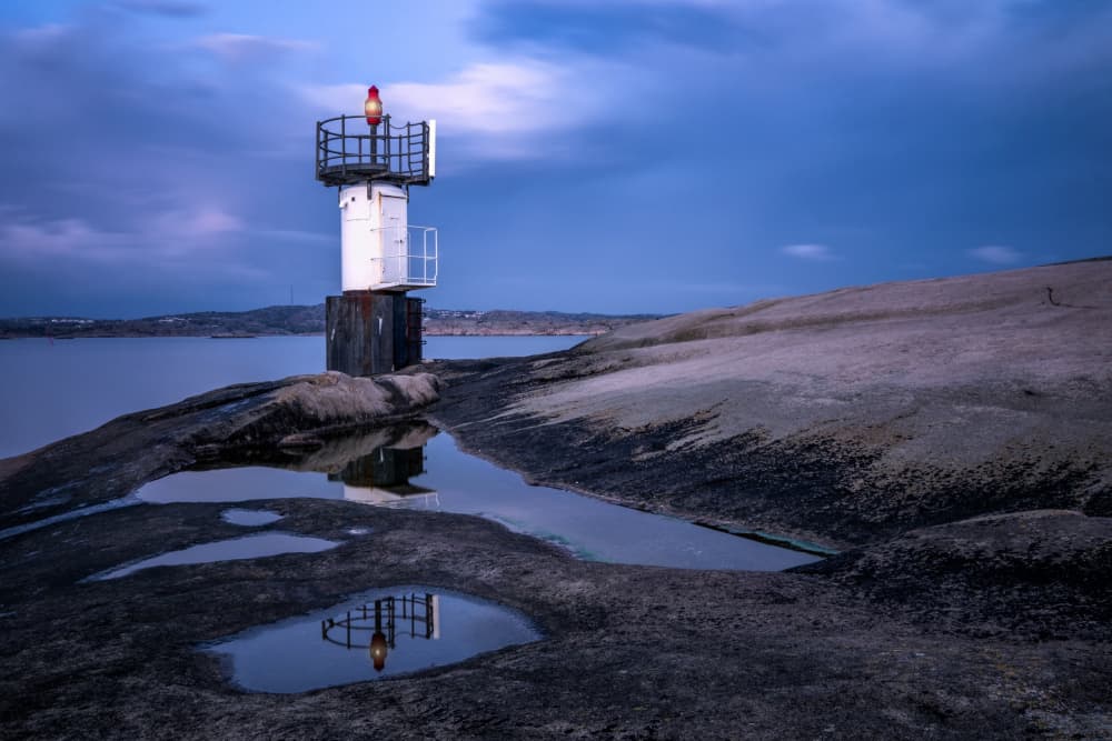 Twilight Lighthouse Reflections by Ludwig Riml — canvas wall art