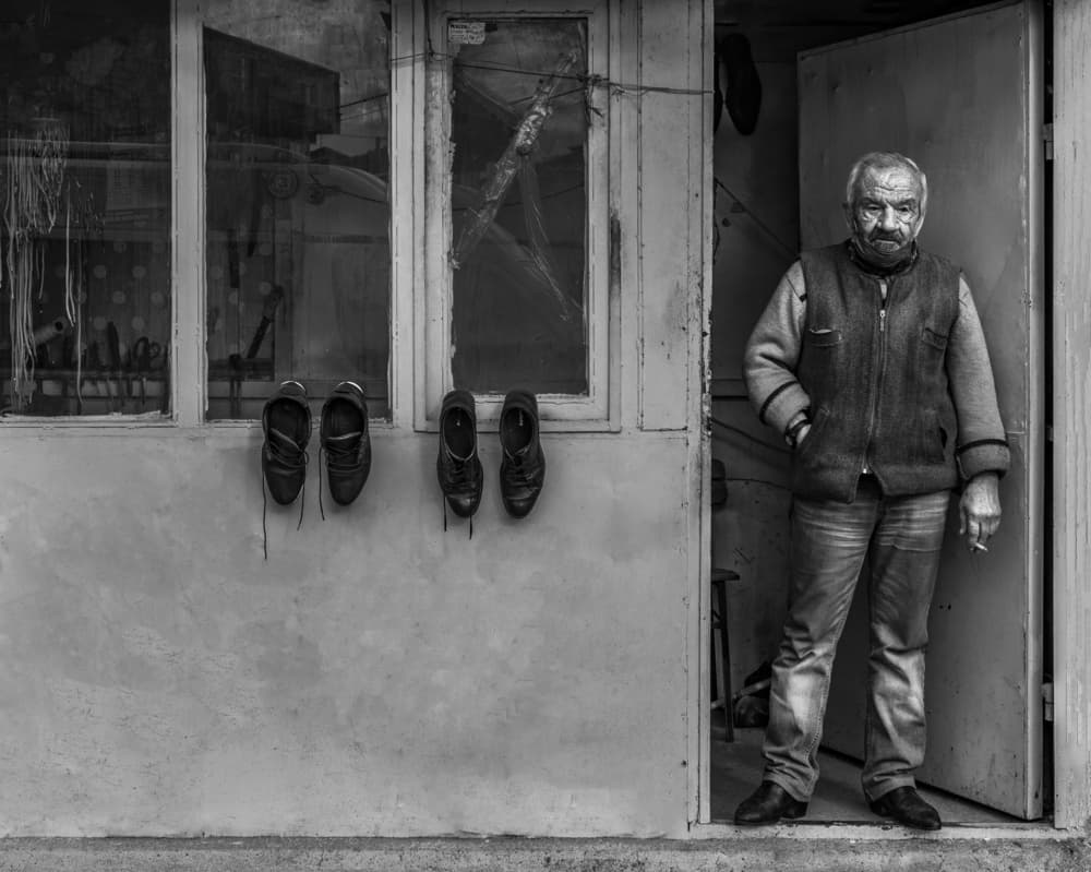 Old Man's Rustic Doorway by Ömer Ates Kızıltug — canvas wall art