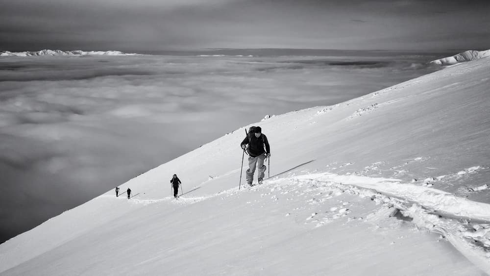 Mountain Hikers Above Clouds by Marcel Rebro — canvas wall art