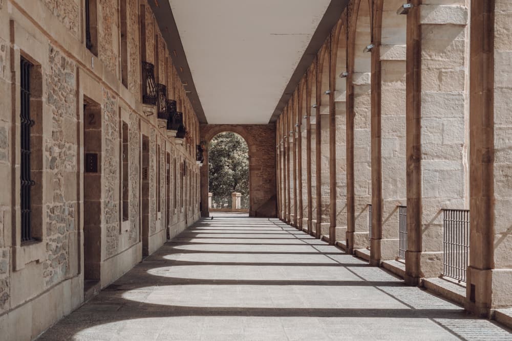 Arched Stone Walkway by Aimee Giles — canvas wall art