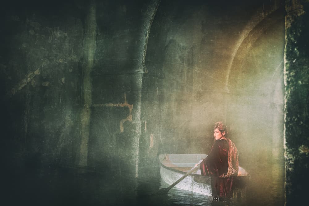Woman on Dark Water by Amnon Eichelberg — canvas wall art