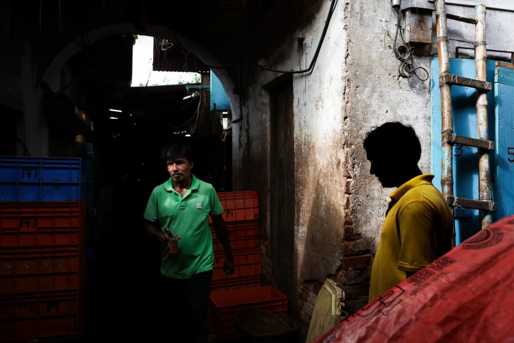 Market Alley Workers by Kuntal Biswas — canvas wall art