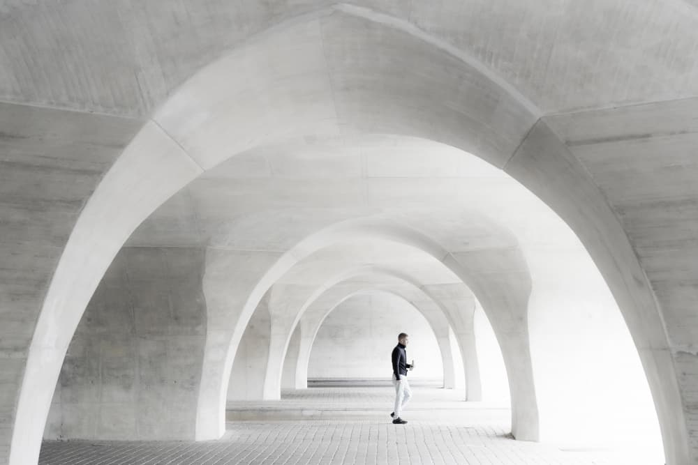Man Under Concrete Arches by Greetje van Son — canvas wall art