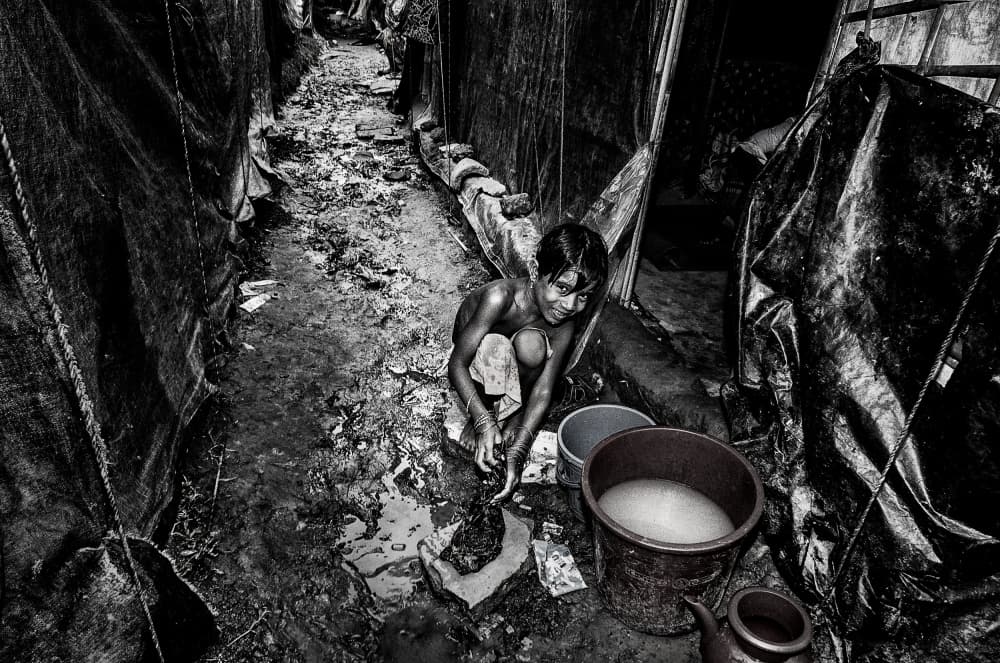 Child Washing in Camp by Joxe Inazio Kuesta Garmendia — canvas wall art