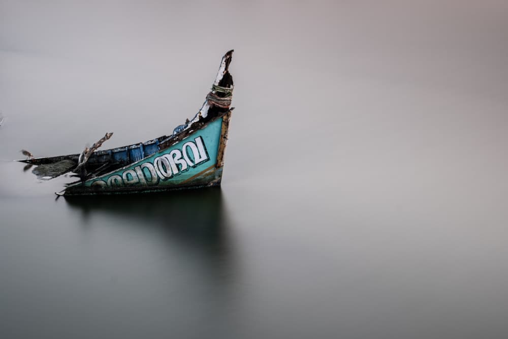 Broken Blue Boat by Robert Bolton — canvas wall art
