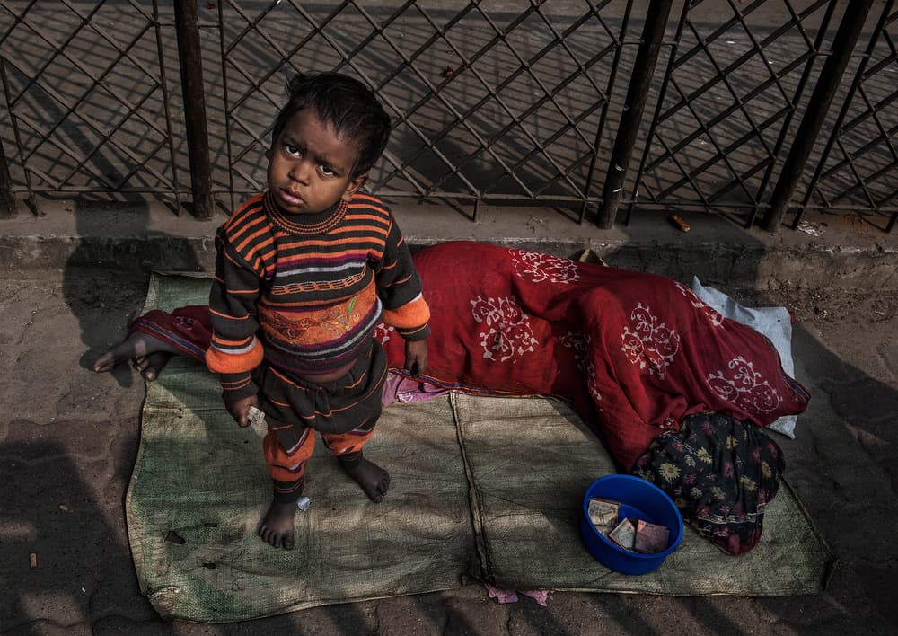 Street Child's Gaze by Joxe Inazio Kuesta Garmendia — canvas wall art