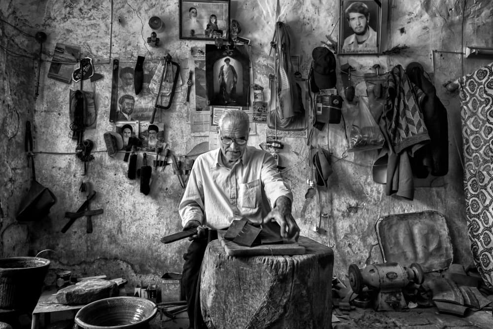 Elderly Craftsman At Work by Mohammadreza Momeni — canvas wall art