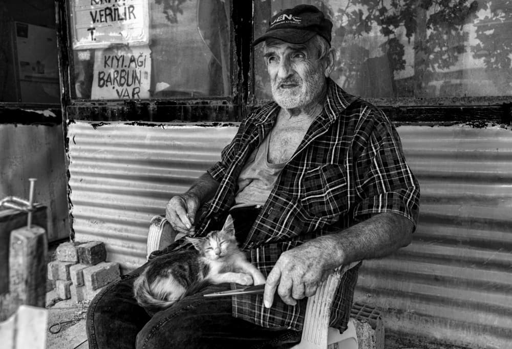 Peaceful Man with Kitten by Ömer Ates Kızıltug — canvas wall art