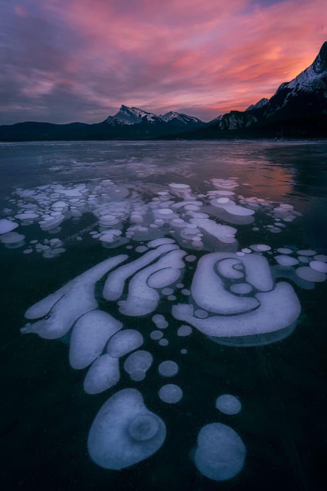 Mountain Sunset Ice Bubbles by Lydia Jacobs — canvas wall art
