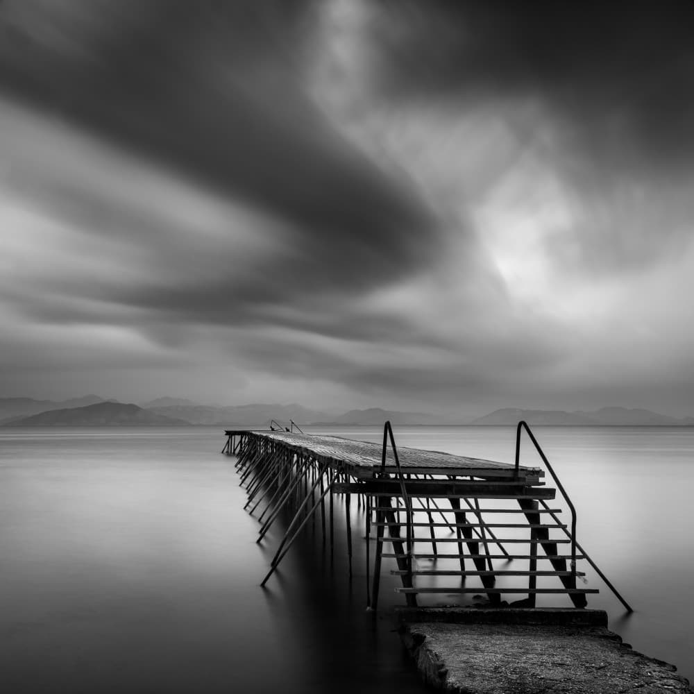 Moody Pier Horizon by George Digalakis — canvas wall art