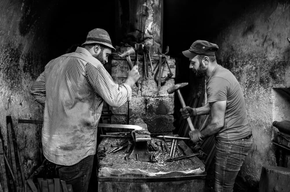 Blacksmiths At Work by Bashar Alsofey — canvas wall art