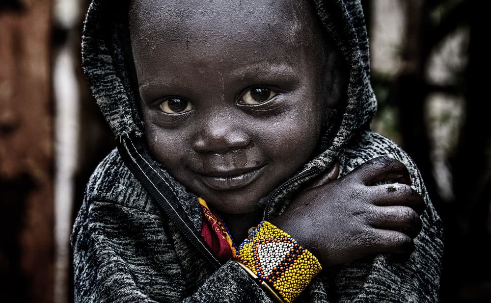 Smiling African Child by Joxe Inazio Kuesta Garmendia — canvas wall art