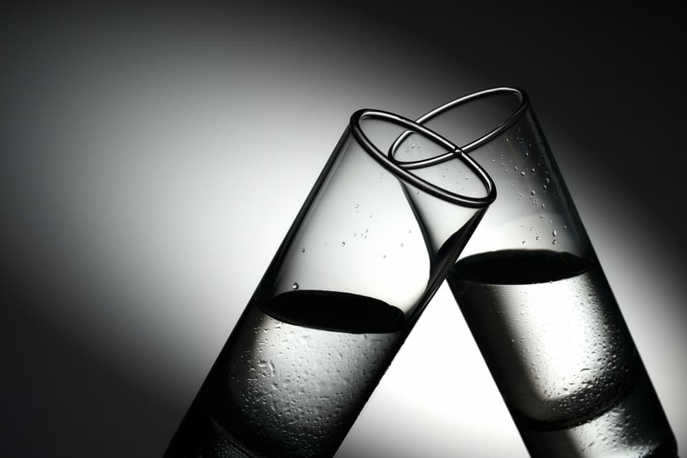Interlocking Test Tubes by Drazen Sokac — canvas wall art