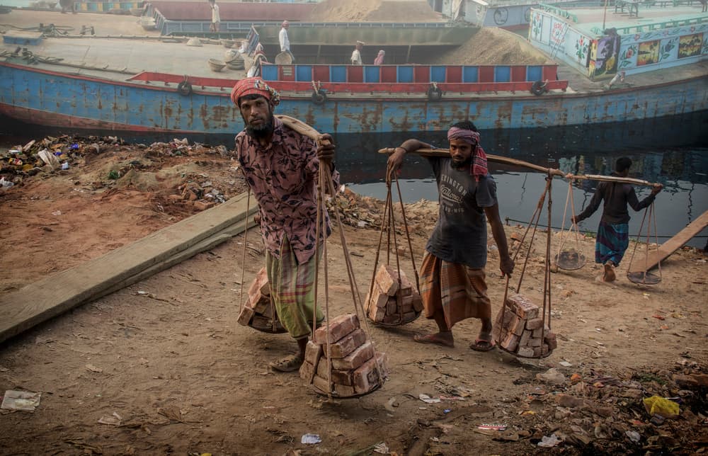 Riverbank Brick Carriers by Elena Molina — canvas wall art