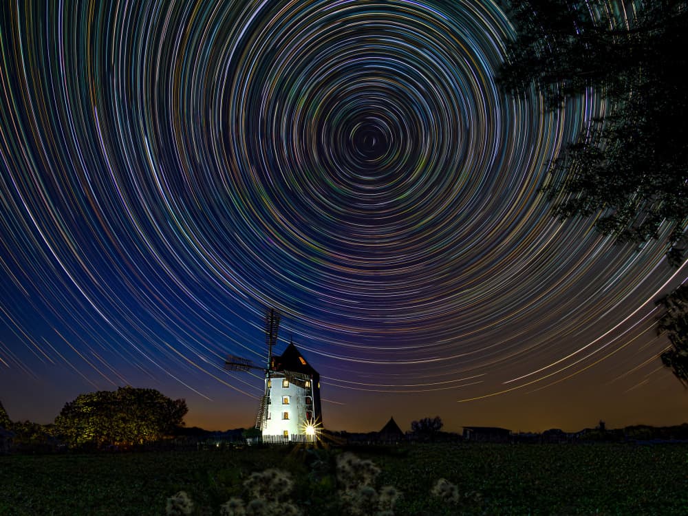 Star Trails Over Windmill by Ilona Rosenkrancová — canvas wall art