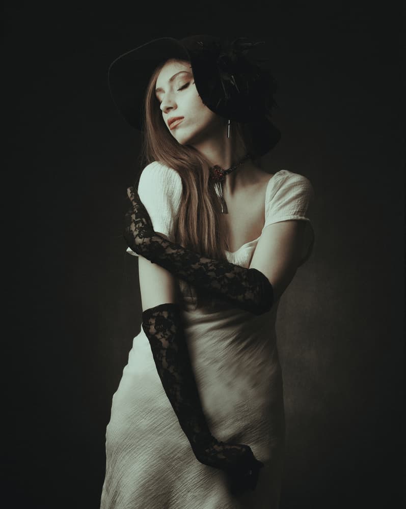 Dreamy Woman Black Hat by Mehdi Mokhtari — canvas wall art