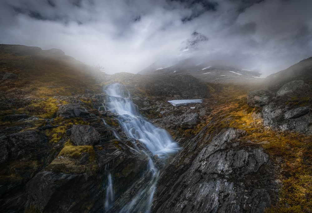Misty Mountain Waterfall by Ole Henrik Skjelstad — canvas wall art