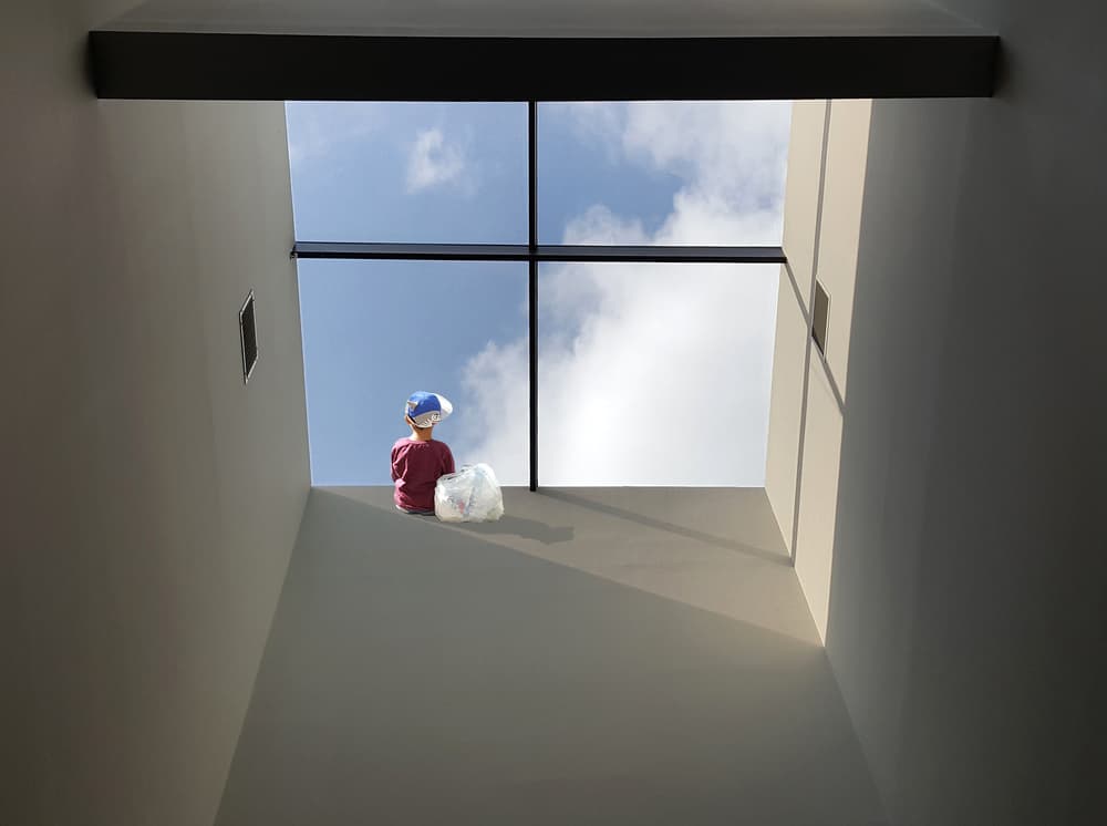 Child Under Blue Sky by Huib Limberg — canvas wall art