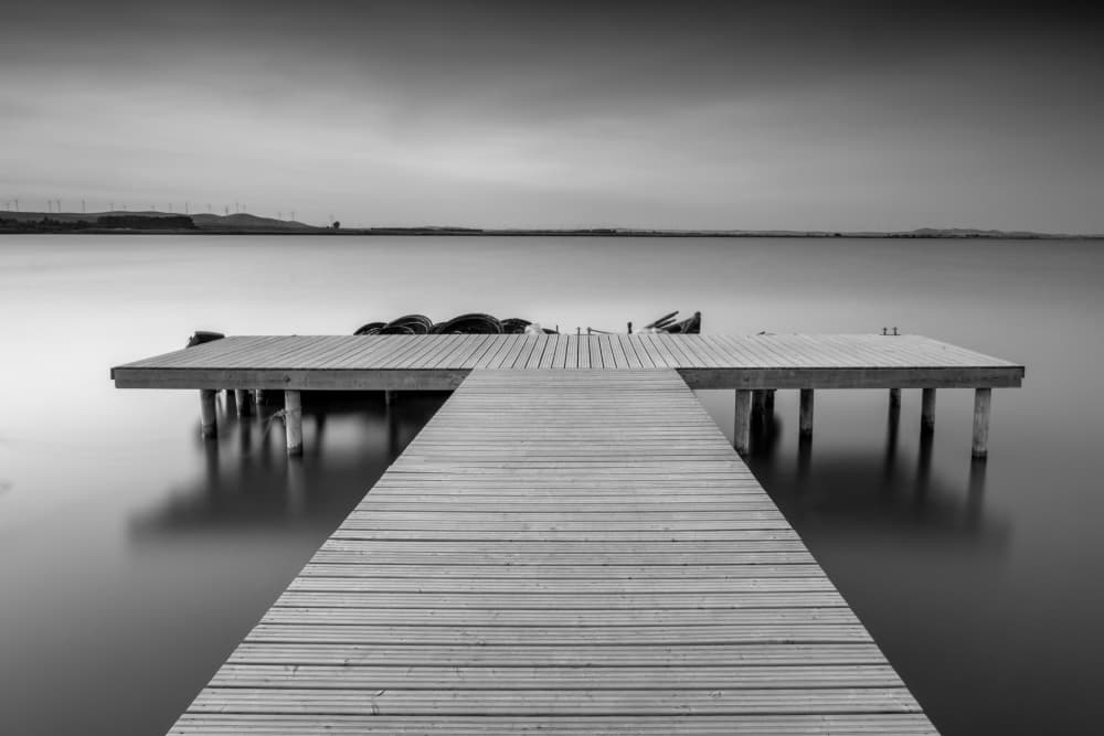 Serene Wooden Pier by Catalin Baican — canvas wall art