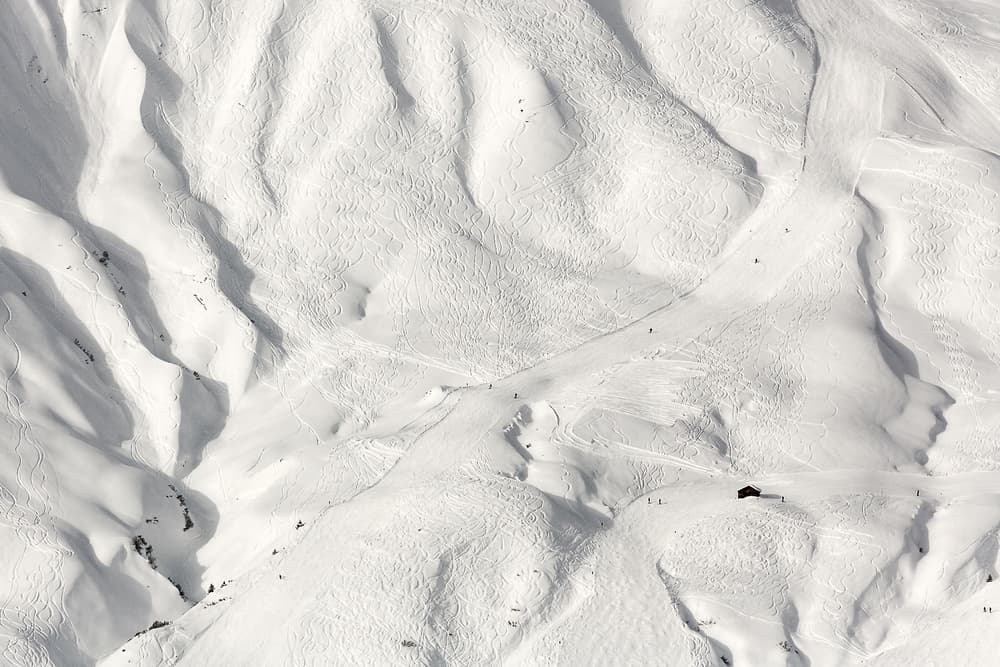 Snowy Ski Slopes by Uschi Hermann — canvas wall art