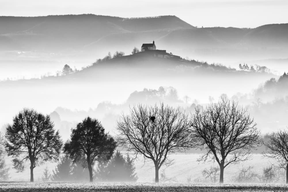 Misty Hilltop Church by Ulrike Leinemann — canvas wall art