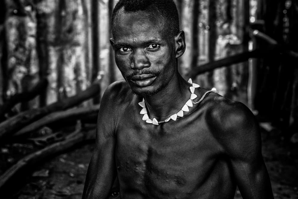Powerful Man With Necklace by Joxe Inazio Kuesta Garmendia — canvas wall art