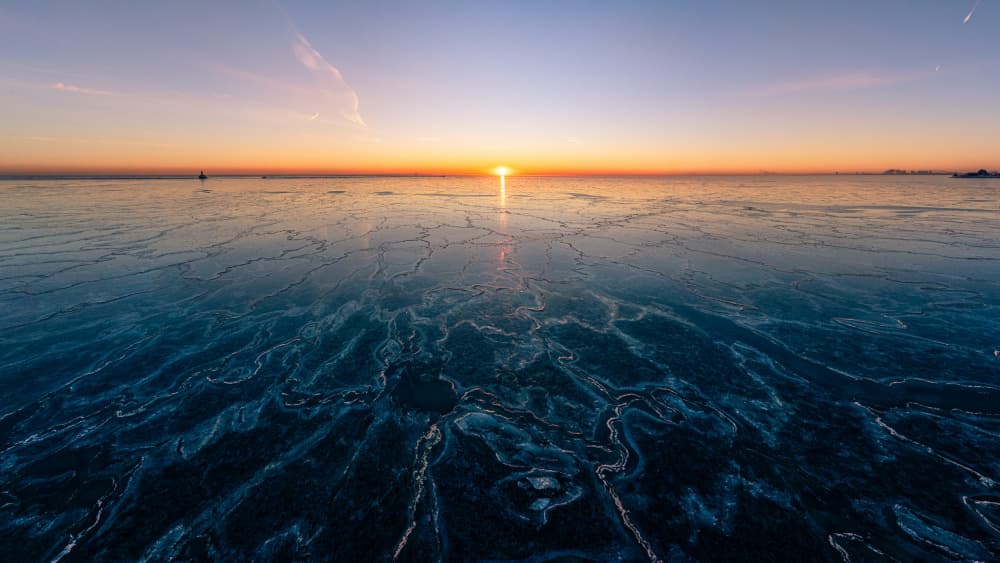 Frozen Dawn Horizon by James Cai — canvas wall art