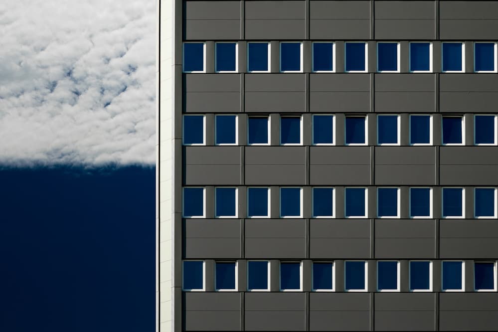 Geometric Building Sky by Karol Važan — canvas wall art