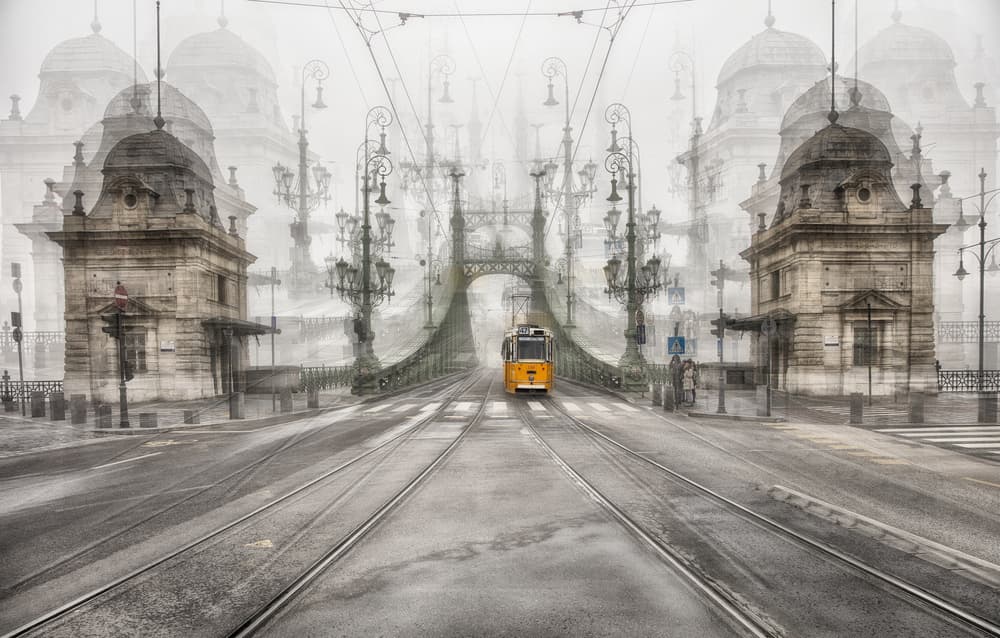 Misty Bridge Tram by C.S. Tjandra — canvas wall art