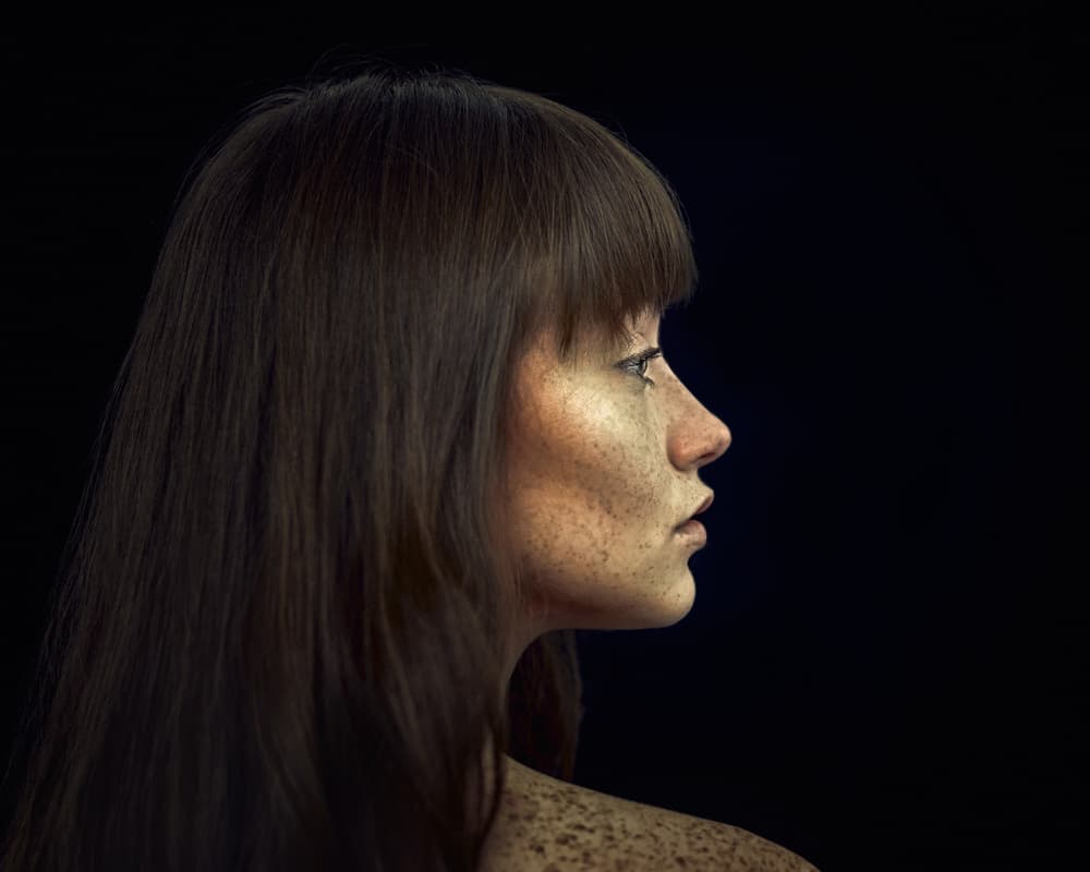 Pensive Freckled Profile by Lech Radecki — canvas wall art
