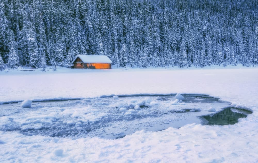 Cozy Cabin Winter Lake by Jenny Qiu — canvas wall art