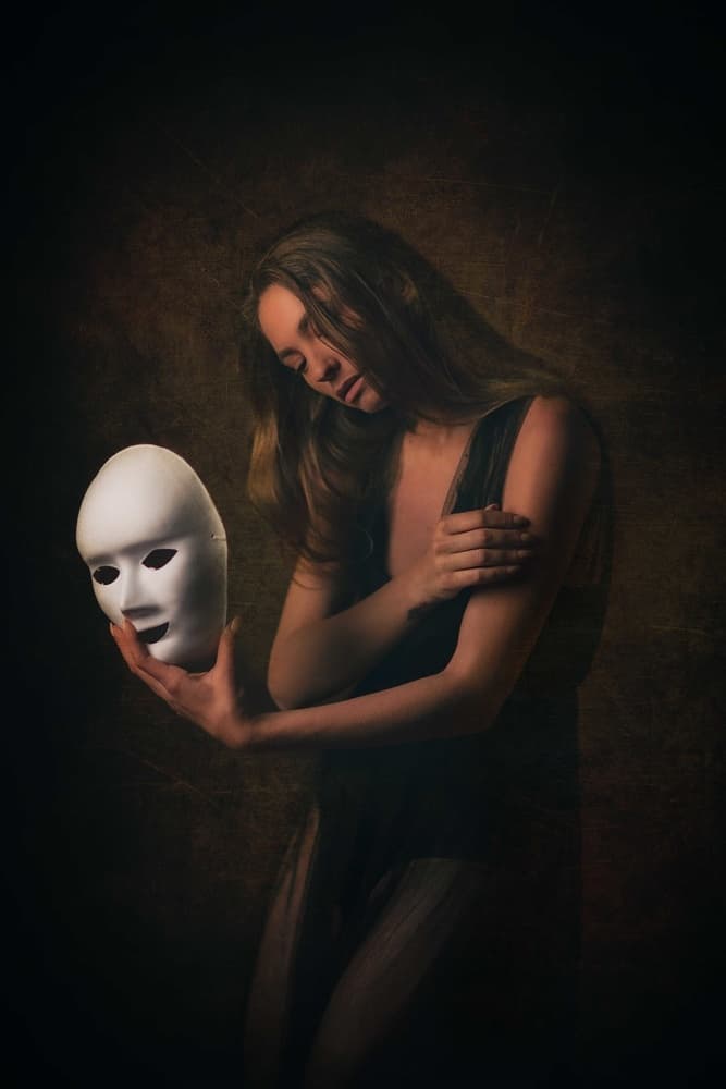 Pensive Woman and Mask by Amnon Eichelberg — canvas wall art