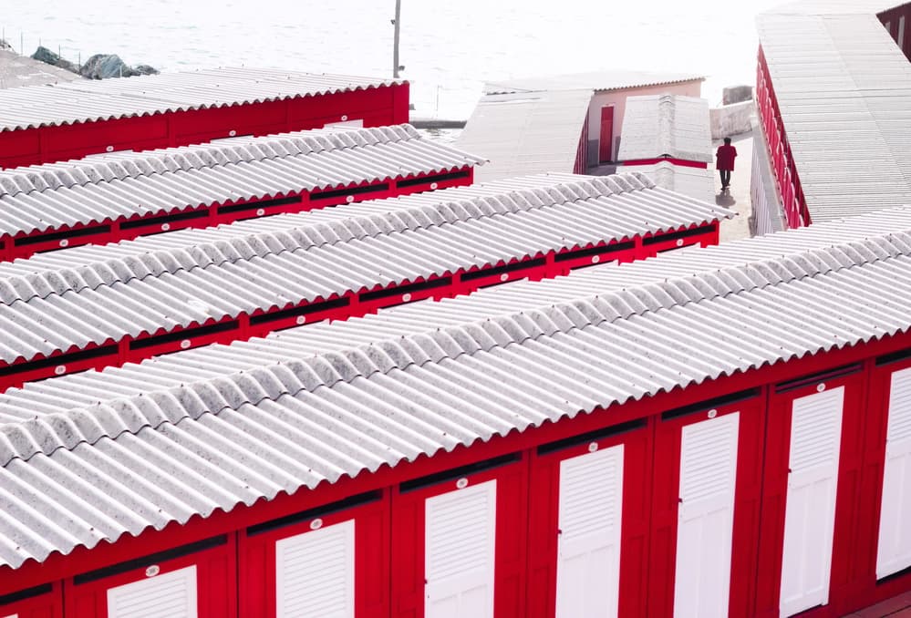 Red Beach Cabins by Paco Palazon — canvas wall art