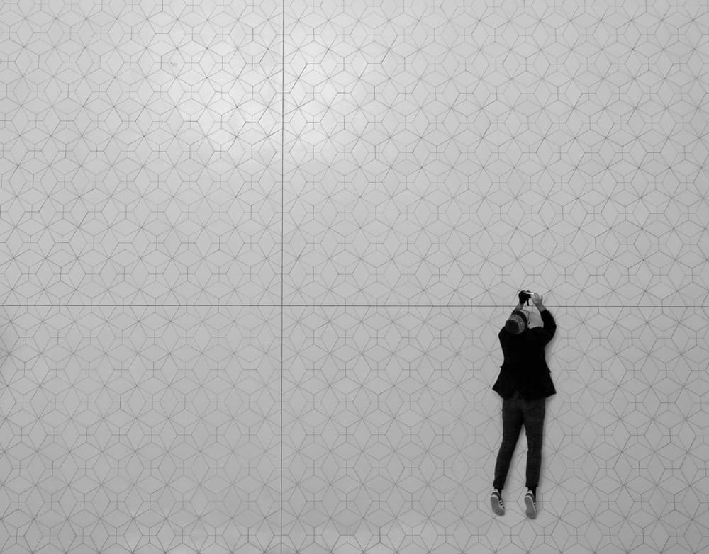 Man on Geometric Floor by Anna Niemiec — canvas wall art