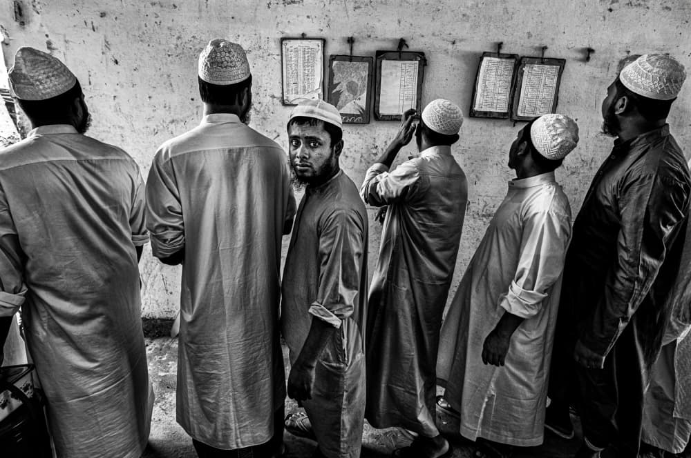 Contemplative Muslim Men by Joxe Inazio Kuesta Garmendia — canvas wall art