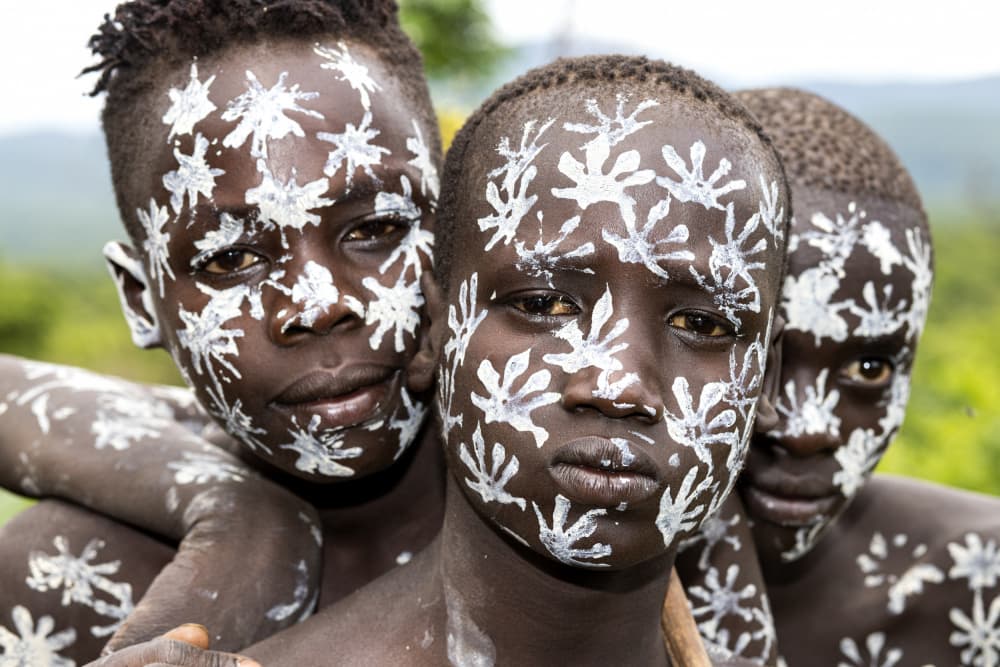 Painted Tribal Faces by Iris Wiener — canvas wall art