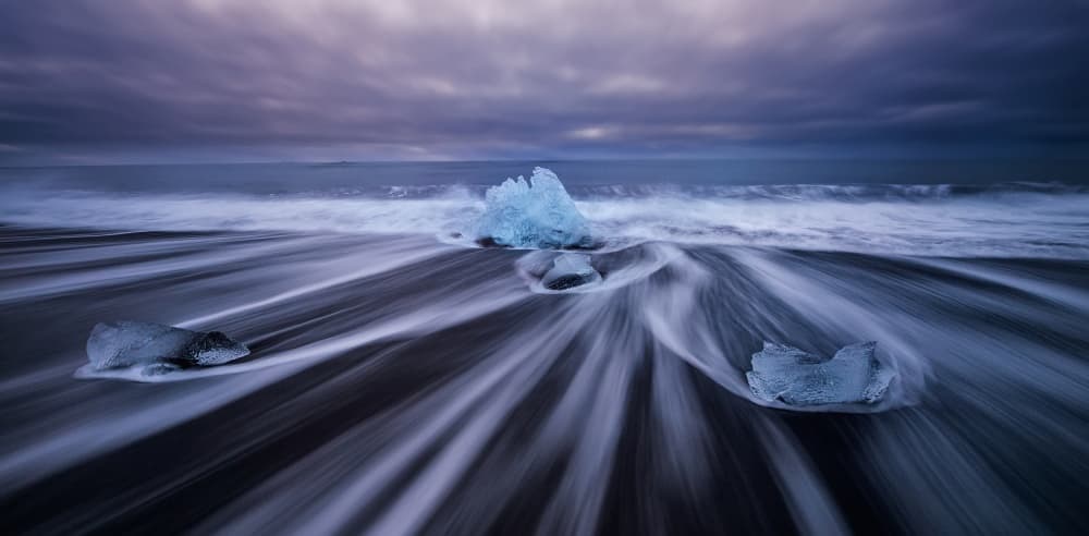 Blue Ice Black Sand by David Martin Castan — canvas wall art