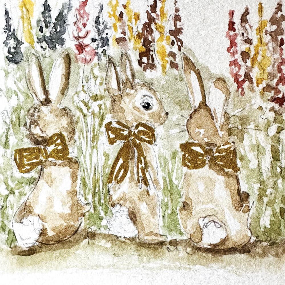 Three Garden Bunnies by Breanna Megan Studio — canvas wall art