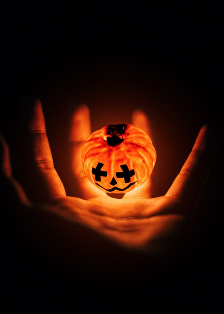 Glowing Pumpkin Hand by Ariz Rab — canvas wall art