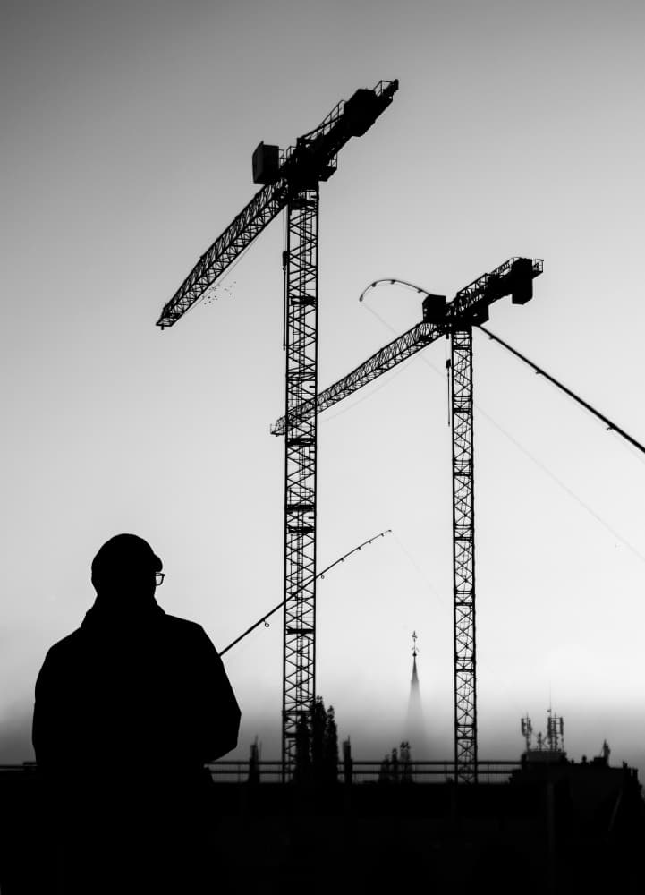 Misty City Fisherman by Anna Niemiec — canvas wall art
