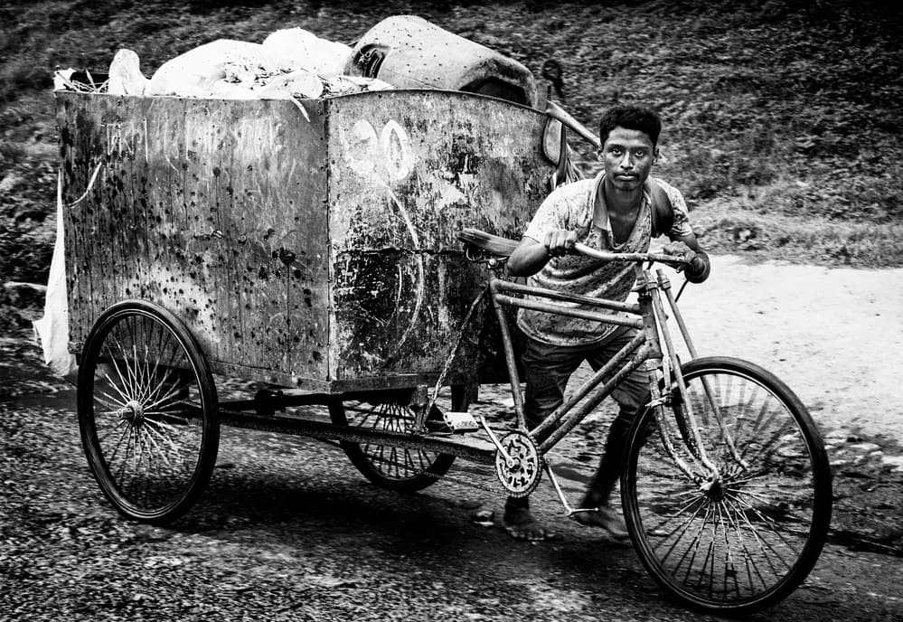 Worker With Cargo Bike by Joxe Inazio Kuesta Garmendia — canvas wall art